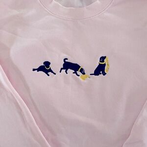 Black lab with yellow leash Embroidered Sweatshirt